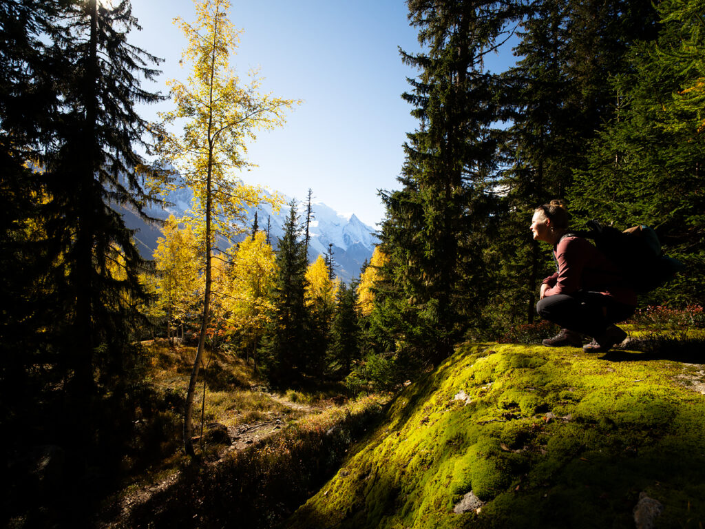 Enjoying the beautiful view from a rock alongside a mountain path near Chamonix.